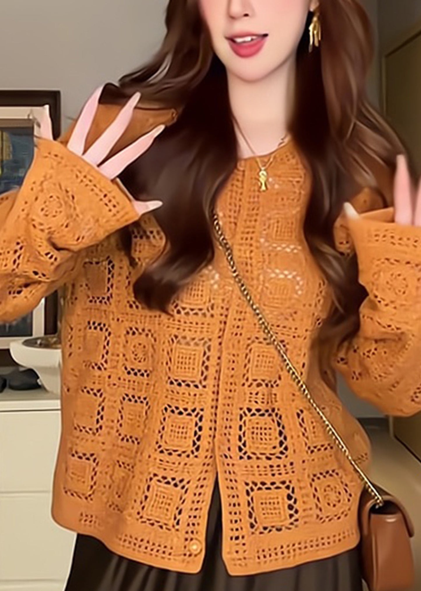 Stilvolle orangefarbene Rundhals-Strickjacke aus einfarbiger Baumwolle mit langen Ärmeln