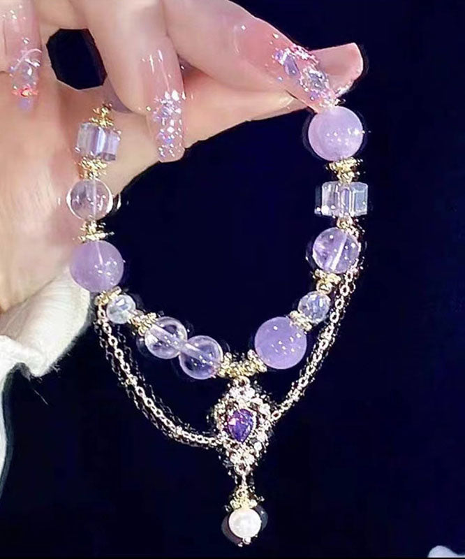 Stilvolles lila Kristallperlen-Charm-Armband