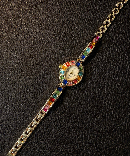 Elegantes relojes de aleación de arcoíris con cristales cromáticos