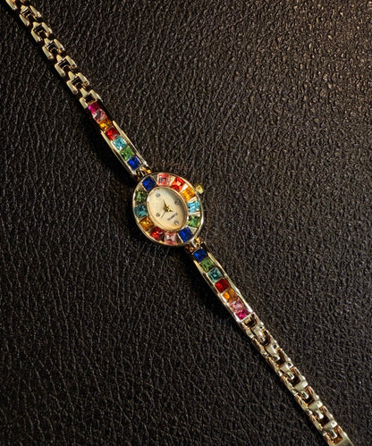 Elegantes relojes de aleación de arcoíris con cristales cromáticos