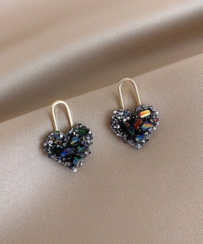 Elegantes pendientes de botón con circonitas Love y cobre dorado con arcoíris