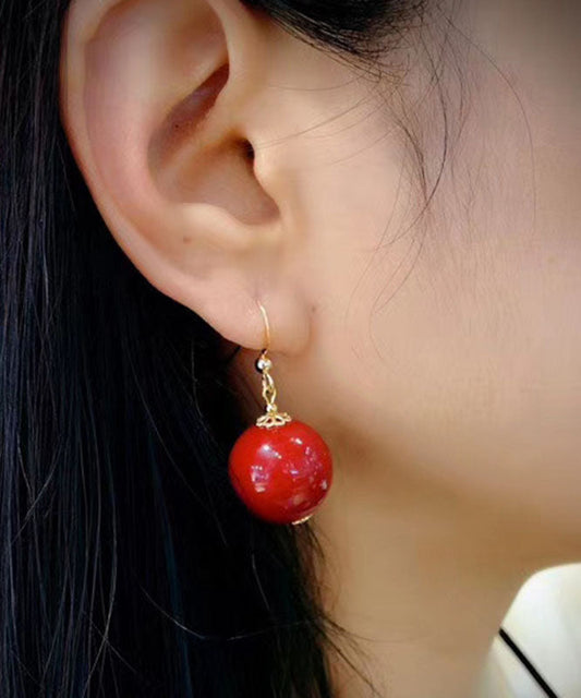 Elegantes aretes colgantes de ágata roja en oro de 14 quilates