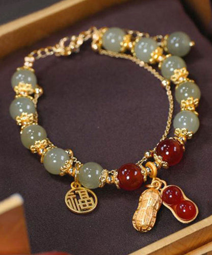 Stilvolles rotes Jade-Erdnuss-Quasten-Charm-Armband aus 18 Karat Gold