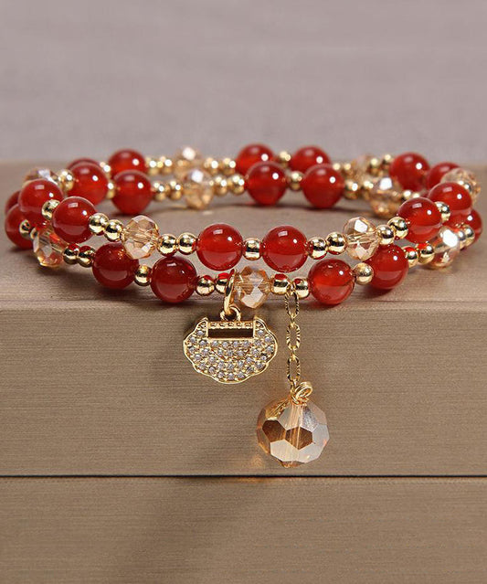 Elegante pulsera con borlas de lentejuelas y circonitas de cristal de aleación roja