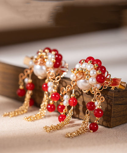 Horquilla con borlas de aleación de cobre rojo con diseño de perla para mujer artista marcial