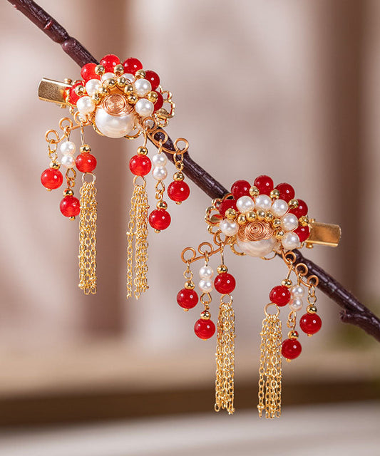 Horquilla con borlas de aleación de cobre rojo con diseño de perla para mujer artista marcial