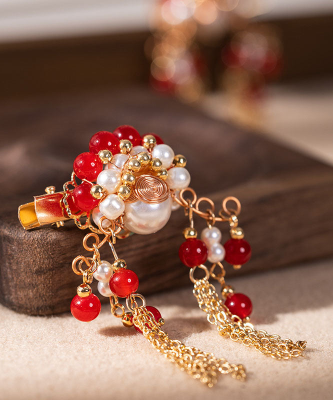 Horquilla con borlas de aleación de cobre rojo con diseño de perla para mujer artista marcial