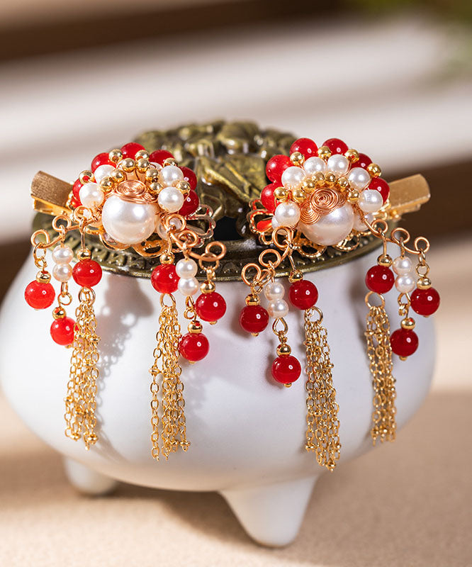 Horquilla con borlas de aleación de cobre rojo con diseño de perla para mujer artista marcial