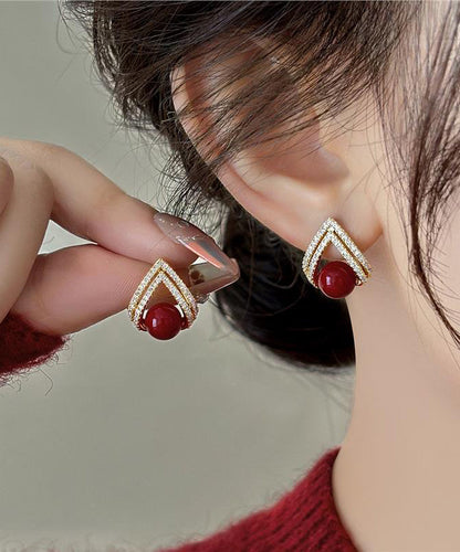 Elegante Ohrstecker aus rotem Kupfer mit Zirkonia-Perlen und Goldauflage