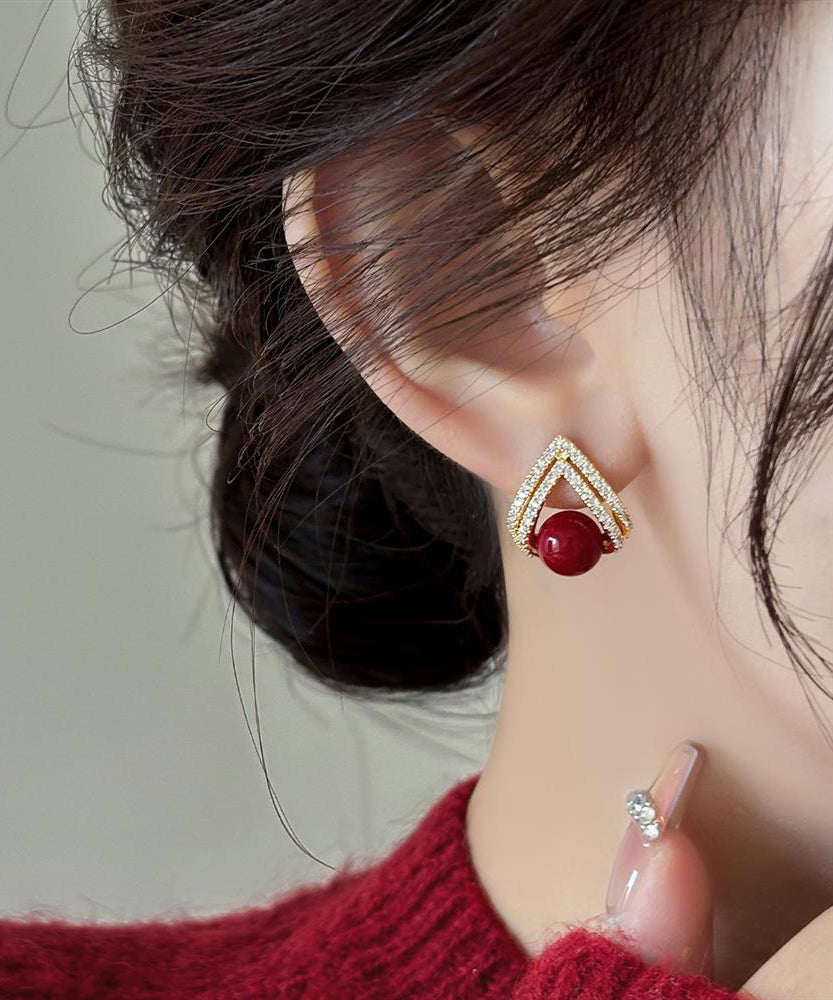 Elegante Ohrstecker aus rotem Kupfer mit Zirkonia-Perlen und Goldauflage