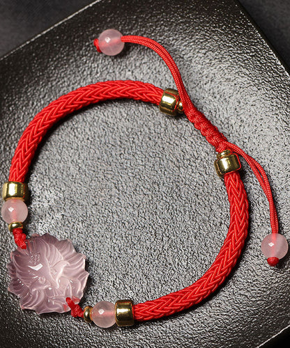 Elegante pulsera con dijes de piedras preciosas de cristal tejidas a mano en rojo