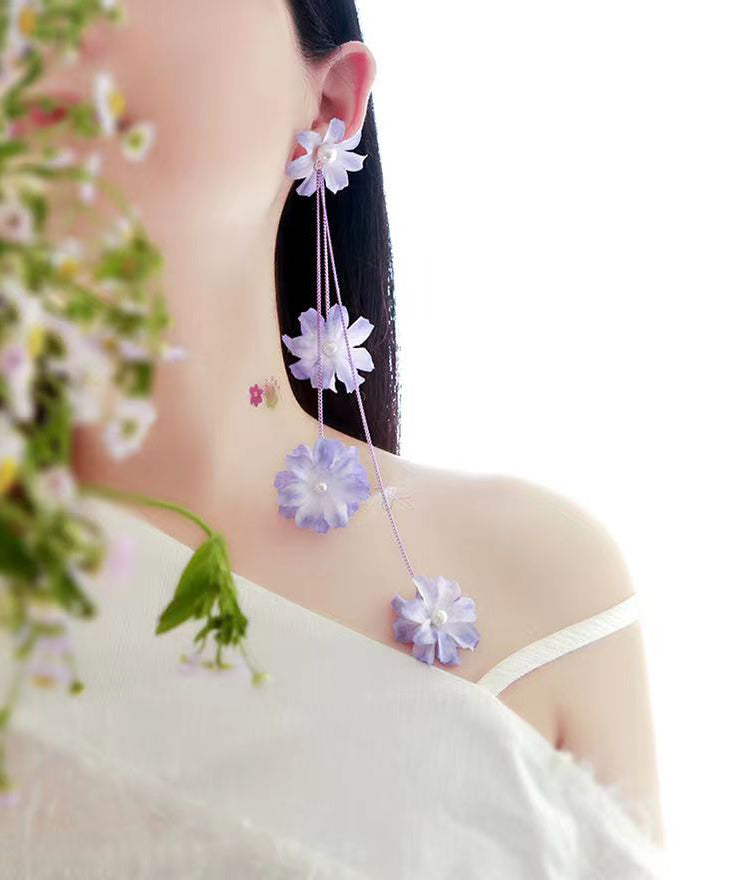 Elegantes pendientes colgantes de margaritas pequeñas de plata de ley roja