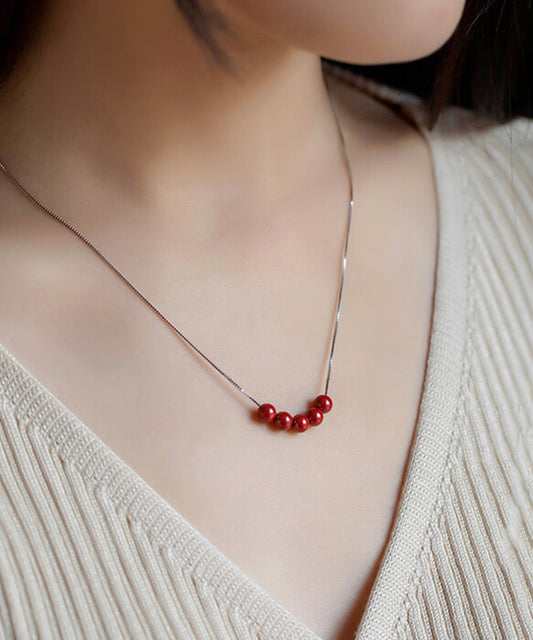 Stilvolle Halskette aus rotem Sterlingsilber mit violettem Goldsand