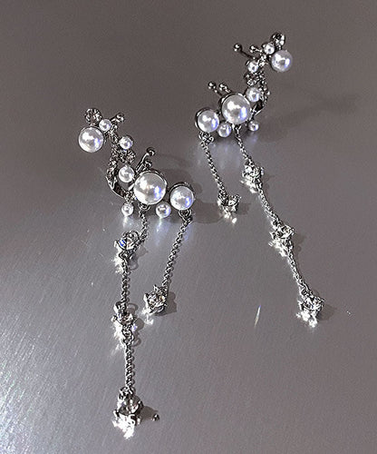 Elegantes pendientes colgantes con borlas de perlas, circonitas y cobre de seda