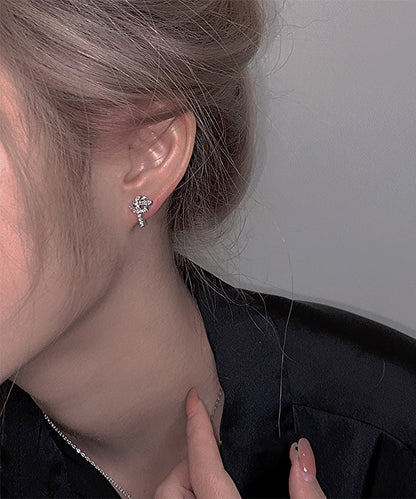 Elegantes pendientes de plata de ley con circonitas y seda