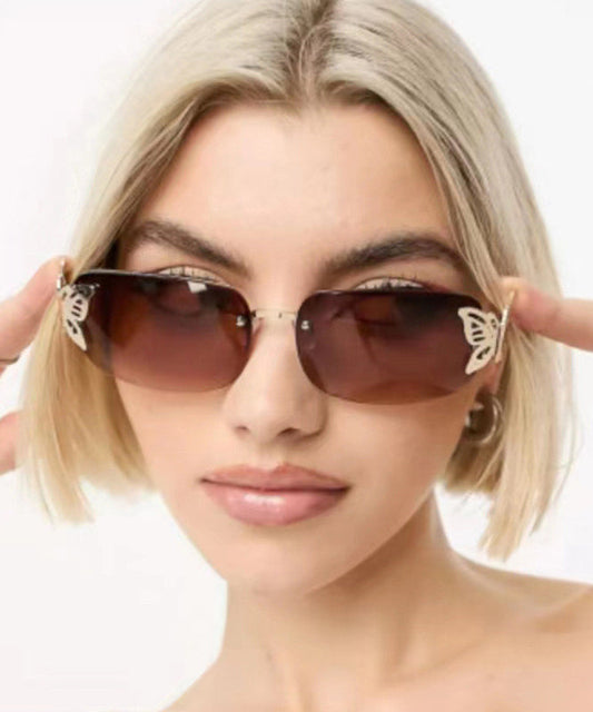 Stylish Tea Color Butterfly Shaped Diamond Studded Frameless Sunglasses