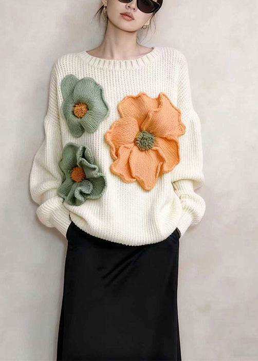 Stilvolle weiße Oversize-Strickoberteile mit Blumenmuster für den Winter