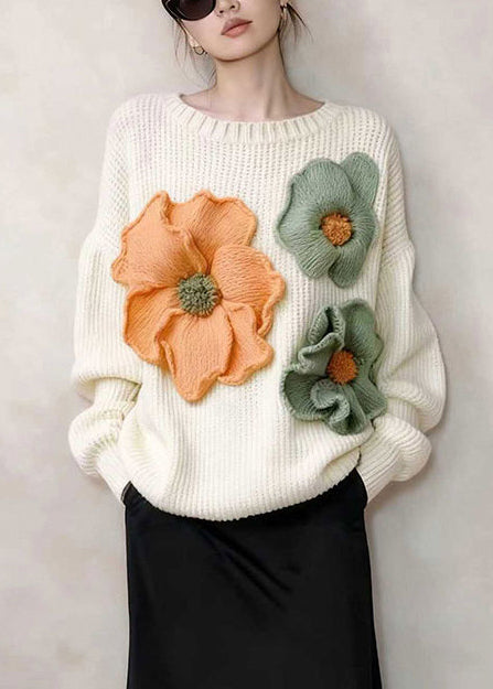 Stilvolle weiße Oversize-Strickoberteile mit Blumenmuster für den Winter