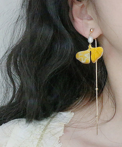Elegantes aretes colgantes con borlas de hojas de ginkgo y perlas de oro amarillo de 14 quilates