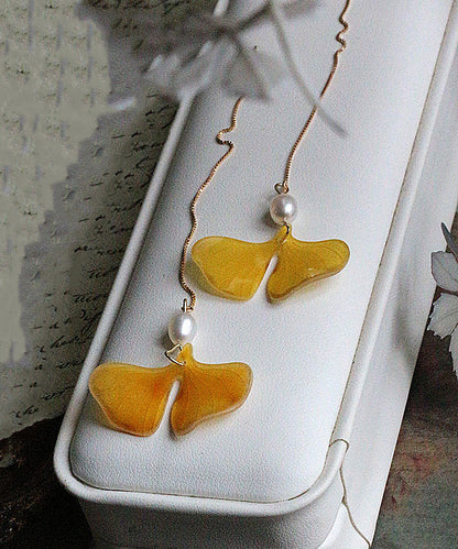Elegantes aretes colgantes con borlas de hojas de ginkgo y perlas de oro amarillo de 14 quilates