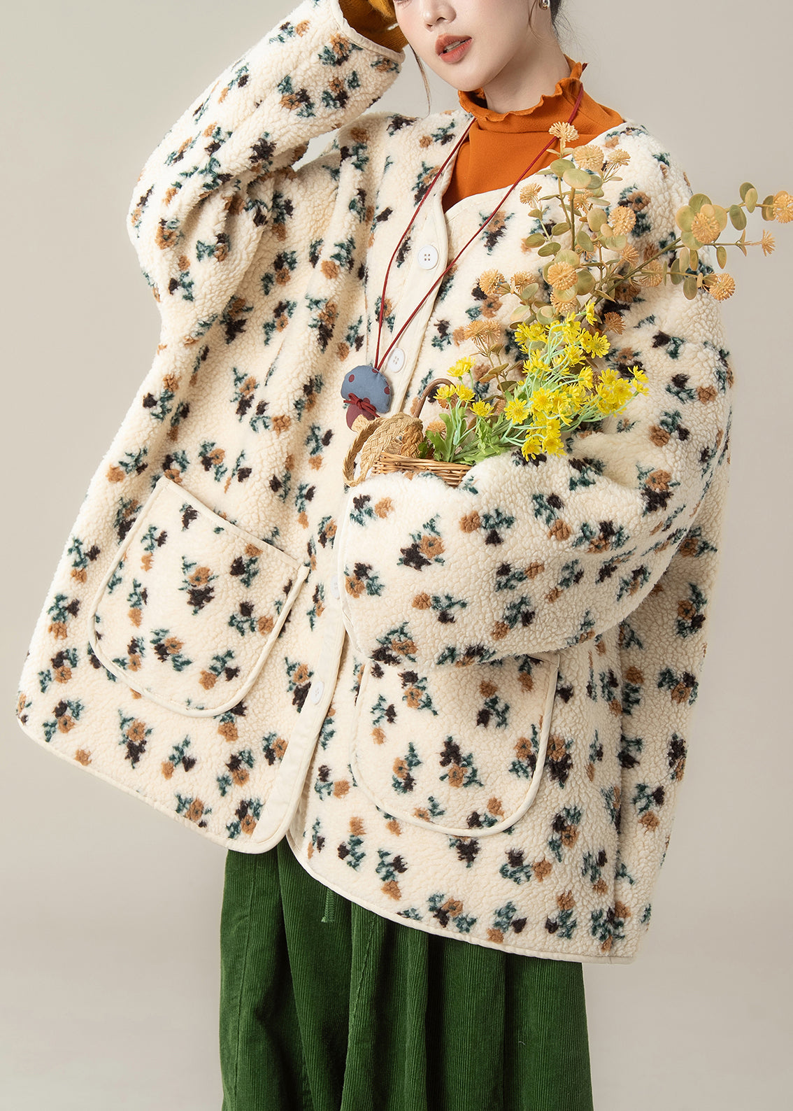 Einzigartiger aprikosenfarbener Oversize-Teddymantel mit Print für den Winter