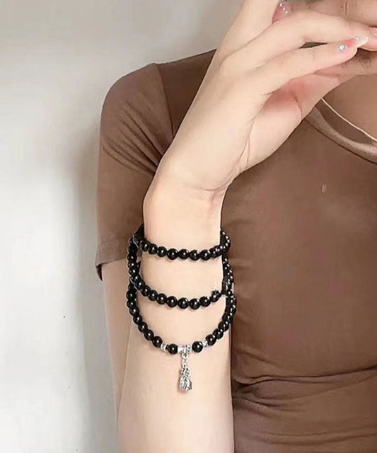 Pulsera única con dije de bolsa de bendición de cuentas de Buda negro