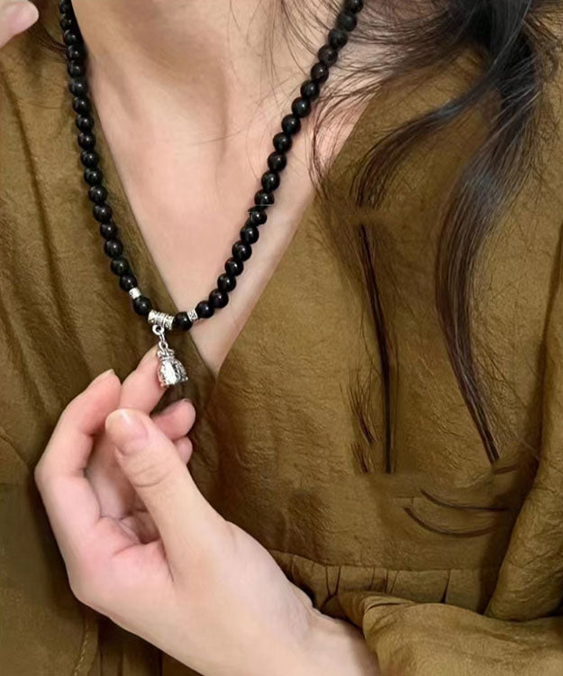 Pulsera única con dije de bolsa de bendición de cuentas de Buda negro