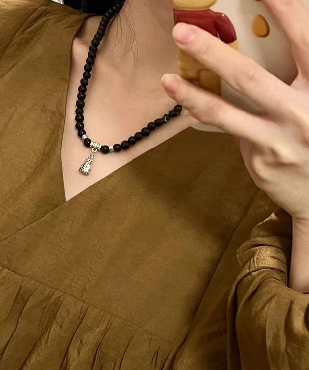 Pulsera única con dije de bolsa de bendición de cuentas de Buda negro