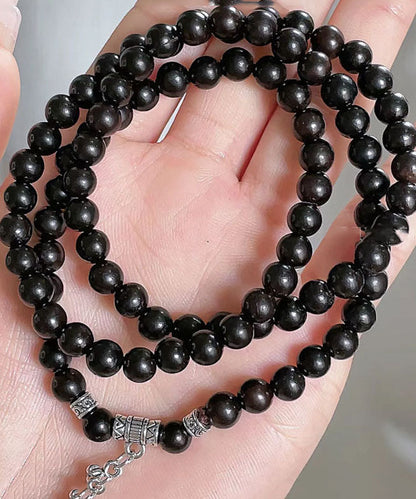 Pulsera única con dije de bolsa de bendición de cuentas de Buda negro