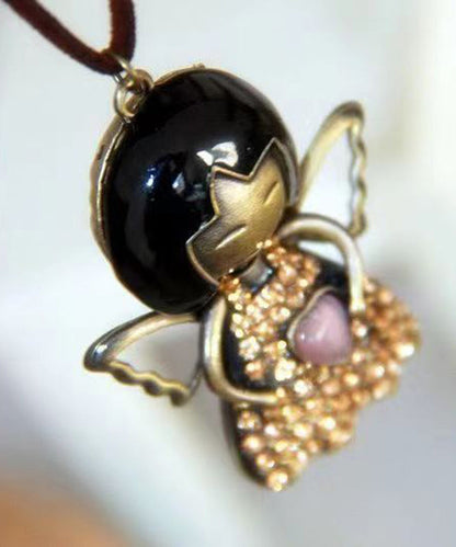 Einzigartige schwarze Halskette mit Anhänger „Love Angel Girl“ aus 45 % Baumwolle und 55 % Leinen.