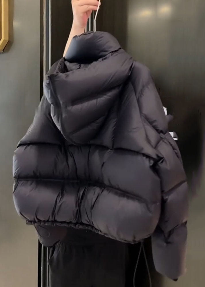 Einzigartiger schwarzer Steppparka mit Taschen und Patchwork-Design für den Winter