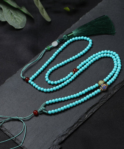 Collar con colgante de borla de cera de abejas, jade turquesa y aleación azul única