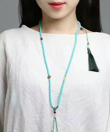 Collar con colgante de borla de cera de abejas, jade turquesa y aleación azul única