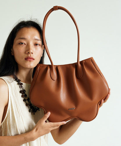 Einzigartige braune Schultertasche aus robustem Kunstleder