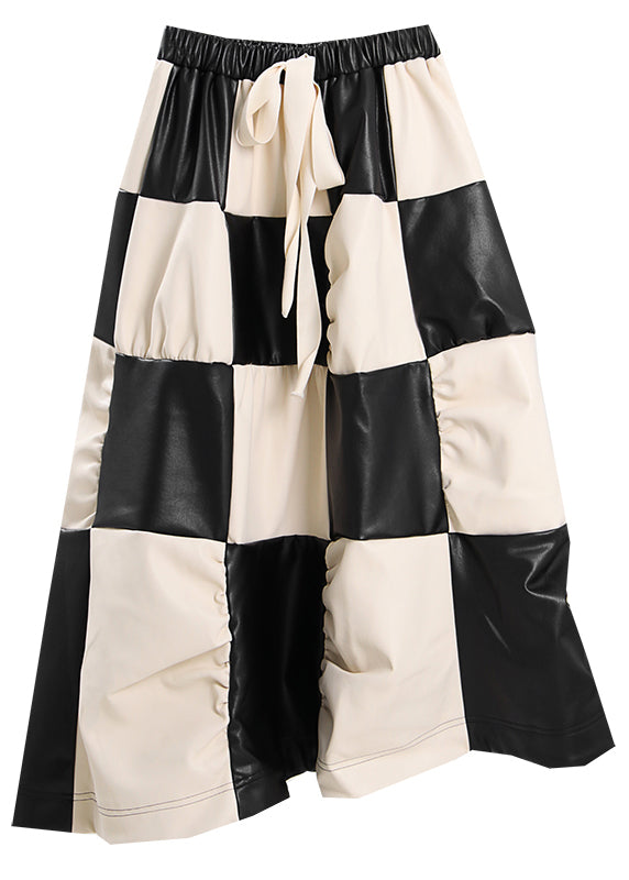 Einzigartiger, geraffter, karierter, zerknitterter Kunstlederrock für den Frühling