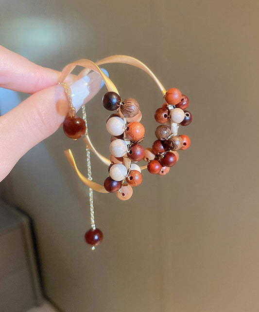 Pendientes de aro con borlas en forma de C y esfericidad de sándalo y aleación de café únicos