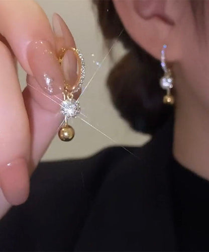 Pendientes colgantes únicos de cobre dorado con incrustaciones de circonita