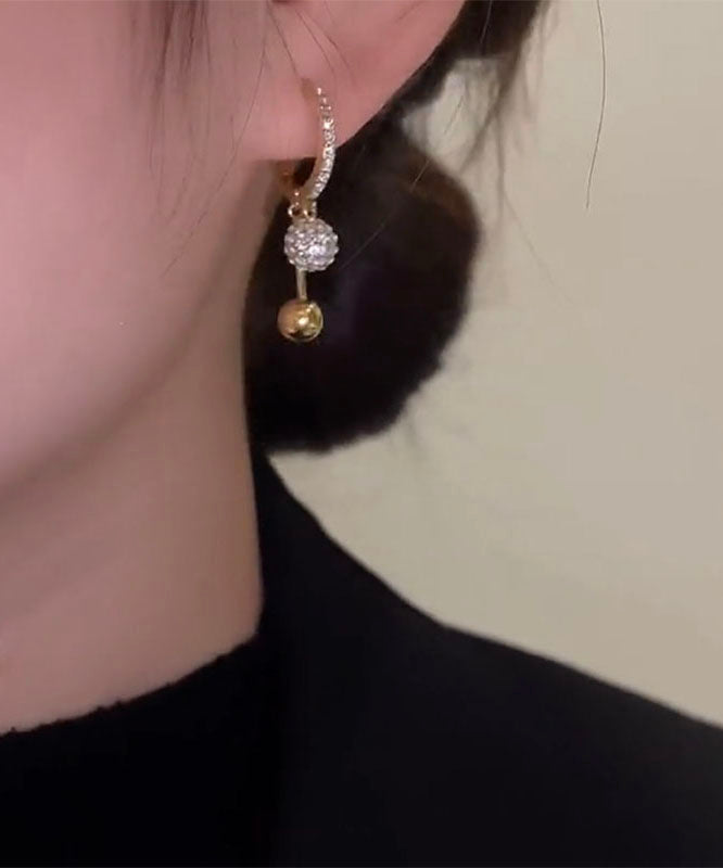 Pendientes colgantes únicos de cobre dorado con incrustaciones de circonita