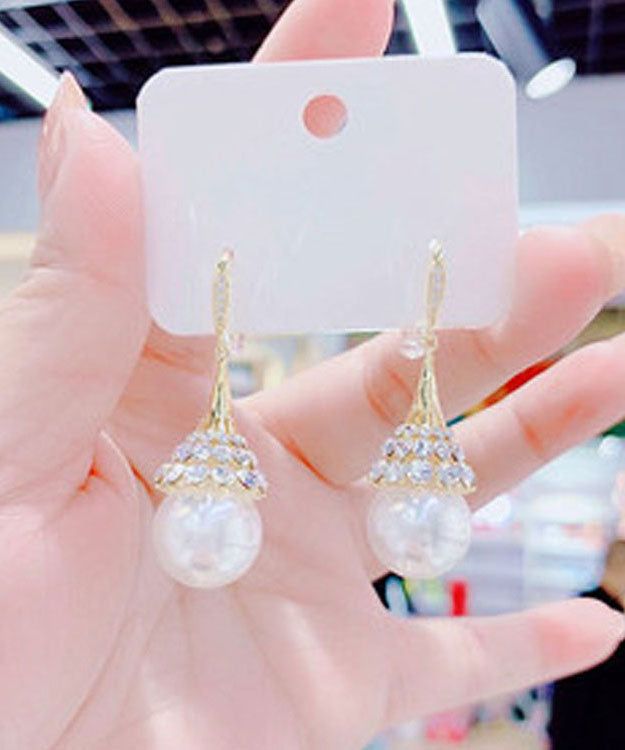 Pendientes únicos de plata de ley verde con circonitas doradas y forma de ojo de gato