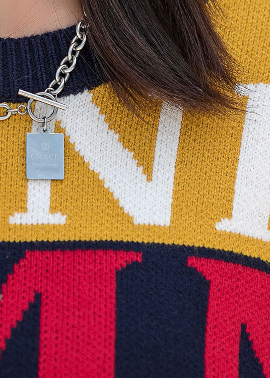 Einzigartiges O-Ausschnitt-Strickkleid mit lockerer Grafik und langen Ärmeln