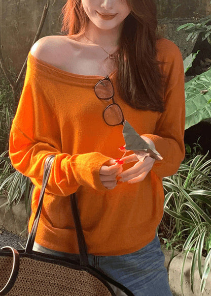 Top de punto fino de algodón con diseño asimétrico naranja único y patchwork para primavera