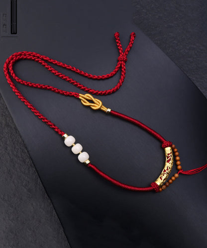 Collar único con colgante de borla de cuentas de jade dorado en cobre rosa