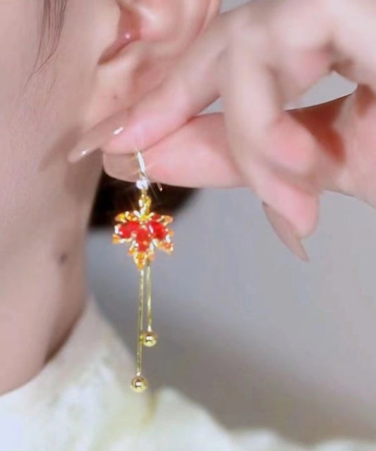 Pendientes únicos de plata de ley roja con borlas y hojas de arce con circonitas doradas