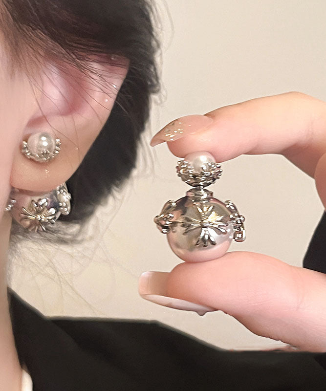 Pendientes únicos de plata de ley con incrustaciones de cobre y perlas de seda