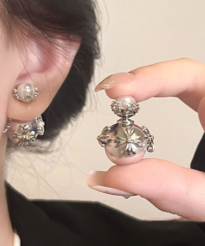 Pendientes únicos de plata de ley con incrustaciones de cobre y perlas de seda