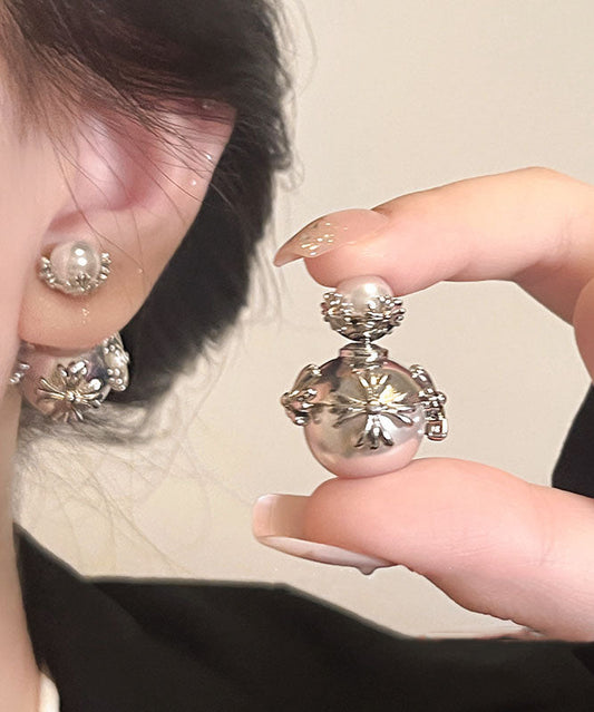 Pendientes únicos de plata de ley con incrustaciones de cobre y perlas de seda