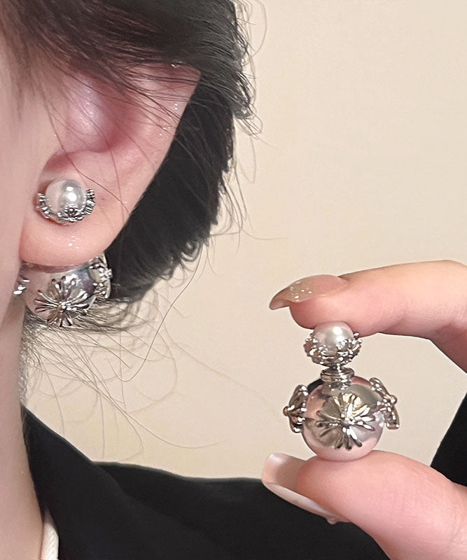 Pendientes únicos de plata de ley con incrustaciones de cobre y perlas de seda