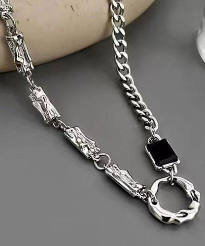 Collar de lazo asimétrico con obsidiana y seda en plata de ley