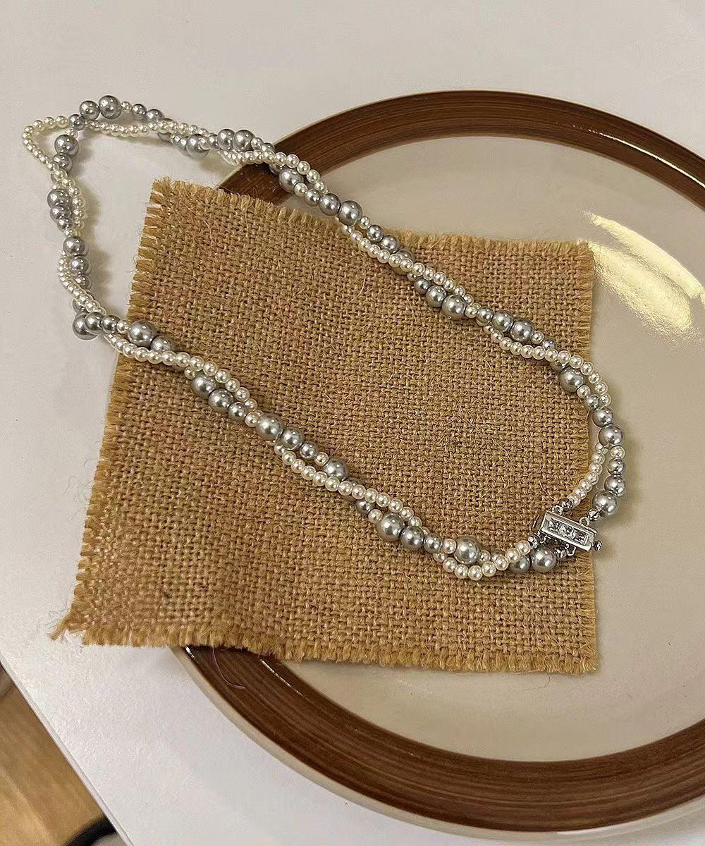 Collar único de acero inoxidable con perlas de doble capa y cuentas graduadas