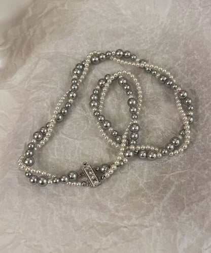 Collar único de acero inoxidable con perlas de doble capa y cuentas graduadas